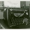 Underwood Elliott Fisher Co. - Woman posing with giant typewriter