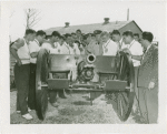 United States - Army - Football players inspect field gun