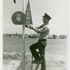 United States - Army - Marine hangs sign