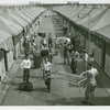 United States - Army - Soldiers moving beds from tents