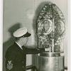 United States - Coast Guard - Guardsman adjusting lamp in lighthouse