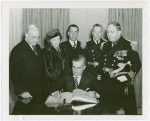 United States - Navy - Charles Edison (Acting Secretary of U.S. Navy) signs guestbook