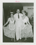 Venezuela Participation - Ernesto López (Commissioner General) and two women in traditional dress