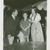 Venezuela Participation - Ernesto López, Lorin Maazel, and hostess at exhibit