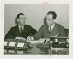 Victoria Falls Exhibit - Norman Yule and Howard Flanigan signing contracts