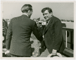 Wendell Wilkie greeting newspaper reporter