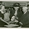 Washington (State) Participation - Harvey Gibson and man in George Washington costume signing guestbook