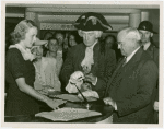 Washington (State) Participation - Harvey Gibson and man in George Washington costume signing guestbook