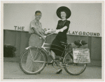 Washington (State) Participation - Man who biked from Washington state to Fair talking with woman
