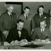 West Virginia Participation - Grover Whalen and officials signing contracts