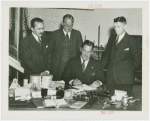 Westinghouse - Grover Whalen and officials at table with electrified objects
