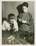 Westinghouse - Boys looking into microscope