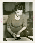 Westinghouse - Woman holding electric razor