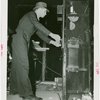 Westinghouse - Man examining machine