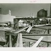 Westinghouse - Building - Workers laying beams on framework