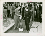 Westinghouse - Time Capsule - Grover Whalen and official lowering time capsule in ground while crowd watches