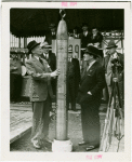 Westinghouse - Time Capsule - Grover Whalen and official lowering time capsule in ground while crowd watches