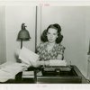 Y.M.C.A. - Woman sitting at desk