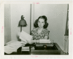 Y.M.C.A. - Woman sitting at desk