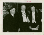 Yugoslavia Participation - Fiorello LaGuardia and Constantin Fotich (Ambassador) with man