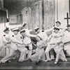 Rosalind Russell and chorus boys dressed as Brazilian cadets in Wonderful Town