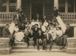 Group portrait of Class III B, El Paso High School. Melville Herskovits seated far right on hand rail.