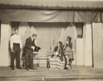 Regina Anderson Andrews (seated) and three unidentified actors in a scene from the Harlem Experimental Theatre production of "A Sunny Morning" 