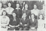 Group photo with young Joseph Papp in suit