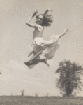 Exterior shot of Doris Humphrey leaping