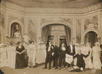 Julian Eltinge (5th from left) and cast in the stage production The Fascinating Widow.