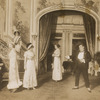 Julian Eltinge (in background on staircase) and cast in the stage production The Fascinating Widow.