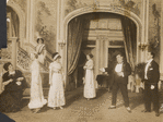 Julian Eltinge (in background on staircase) and cast in the stage production The Fascinating Widow.