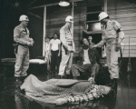 Dorian Harewood (sitting) and unidentified cast members in the stage production Streamers