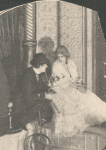 Clyde Fitch (author and stage director) giving points to Julia Marlowe (actress and star) prior to the production of "Barbara Frietchie"