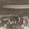 Scene in Bricktop's, Paris, 1932. Ada "Bricktop" Smith standing at right.