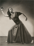 Full-length studio portrait of Doris Humphrey in "New Dance". 