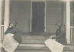Doris Humphrey (double image) sitting on porch stair in Forest Park, Michigan.