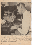 Author Richard Wright sitting at typewriter and listening through an Ediphone to create a draft of his autobiography "Black Boy."