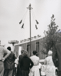 Visitors watching "The famous Voladores" at the Pavillion of Mexico