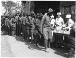 African-American soldiers on a soup line, at the YMCA'.