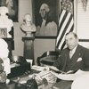 Congressman Sol Bloom, Representative from New York and Associate Director United States George Washington Bicentennial Commission seated at his desk at the Commission Headquarters, Washington D.C.