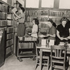 Rearranging books in Port Richmond Library