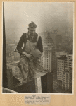 December 18, 1924. A San Francisco iron worker standing on beam on top of forty story building at hour of funeral in New York