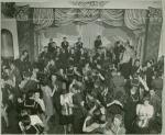 Service men performing while other dance.