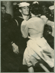 Service man dancing with woman