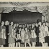 Hostesses and service men with Santa.