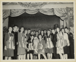 Hostesses and service men with Santa.