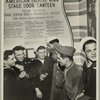 Service men standing in front of sign