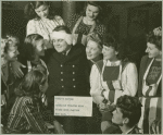 "Hero's Return" - Wounded service man seated with hostesses at Stage Door Canteen (New York).