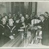 Service men being served drinks at bar